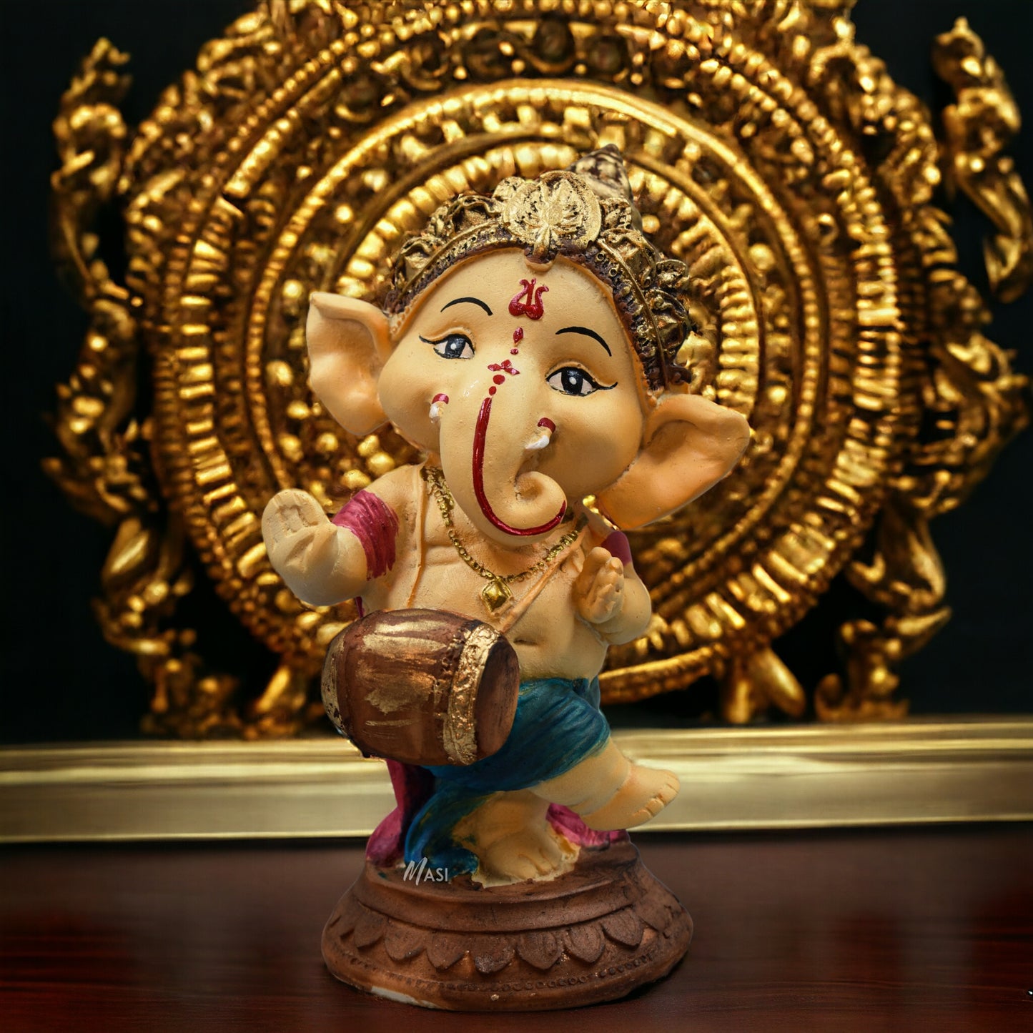 Lord Ganesha Idol Playing Dholak Decorative Showpiece