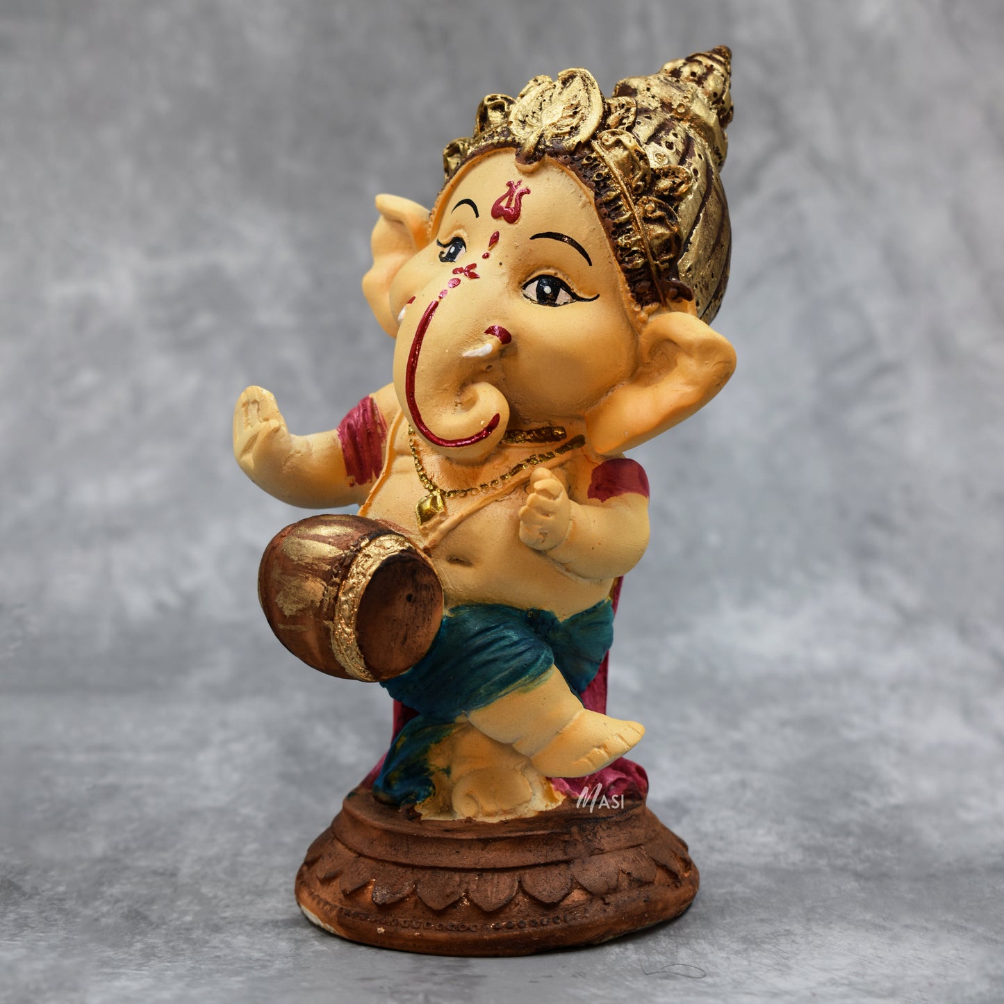 Lord Ganesha Idol Playing Dholak Decorative Showpiece
