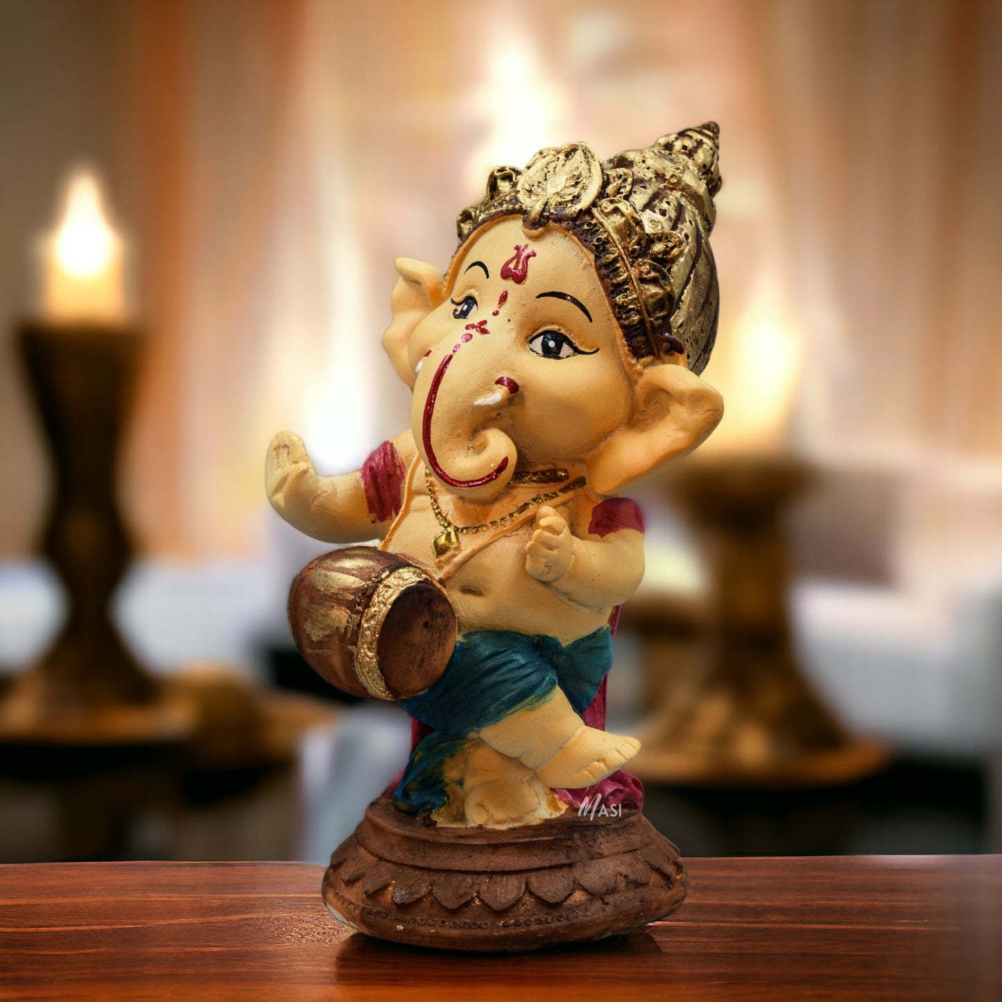Lord Ganesha Idol Playing Dholak Decorative Showpiece