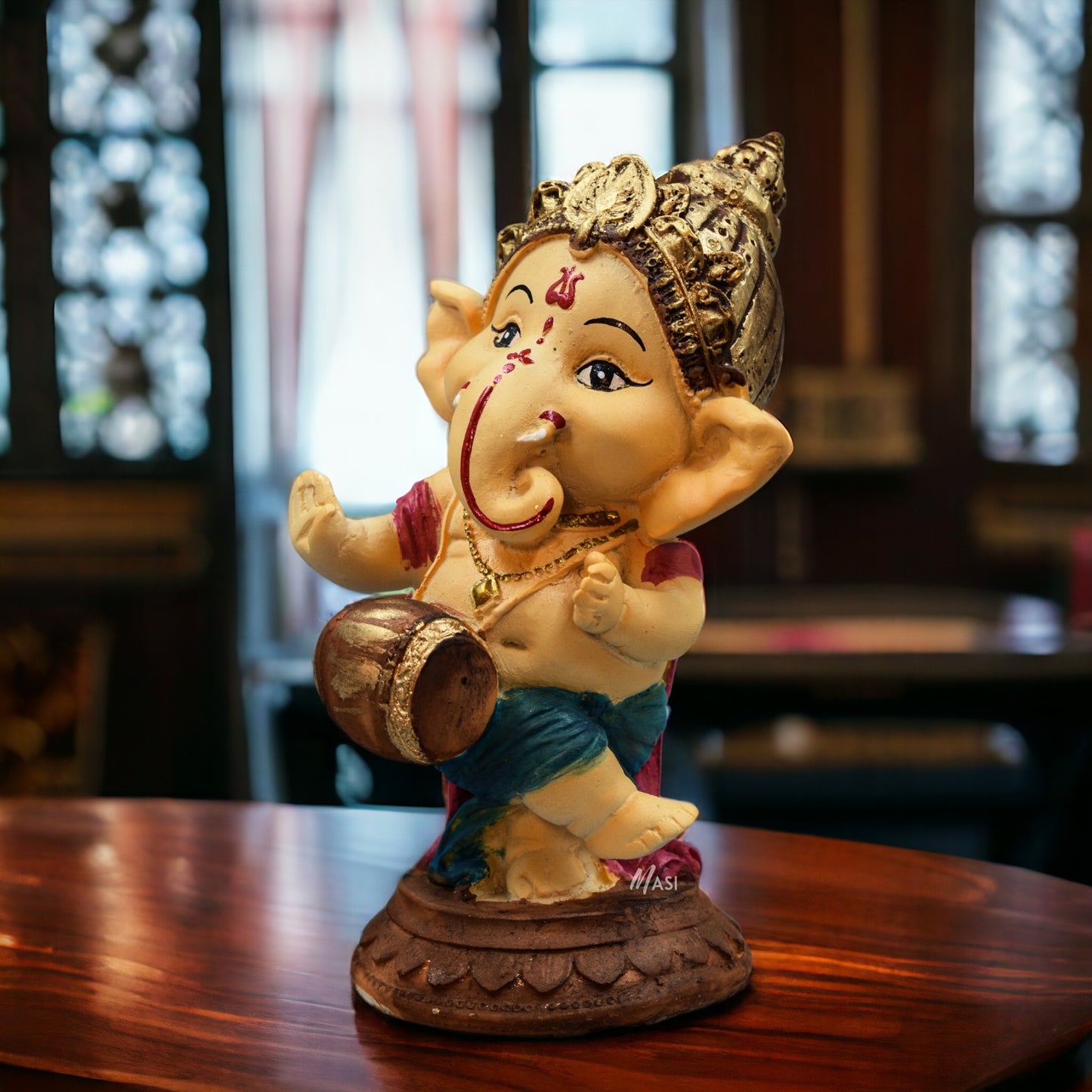 Lord Ganesha Idol Playing Dholak Decorative Showpiece